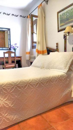 Отель Hostal El Cascapeñas de la Alpujarra  Капилейра